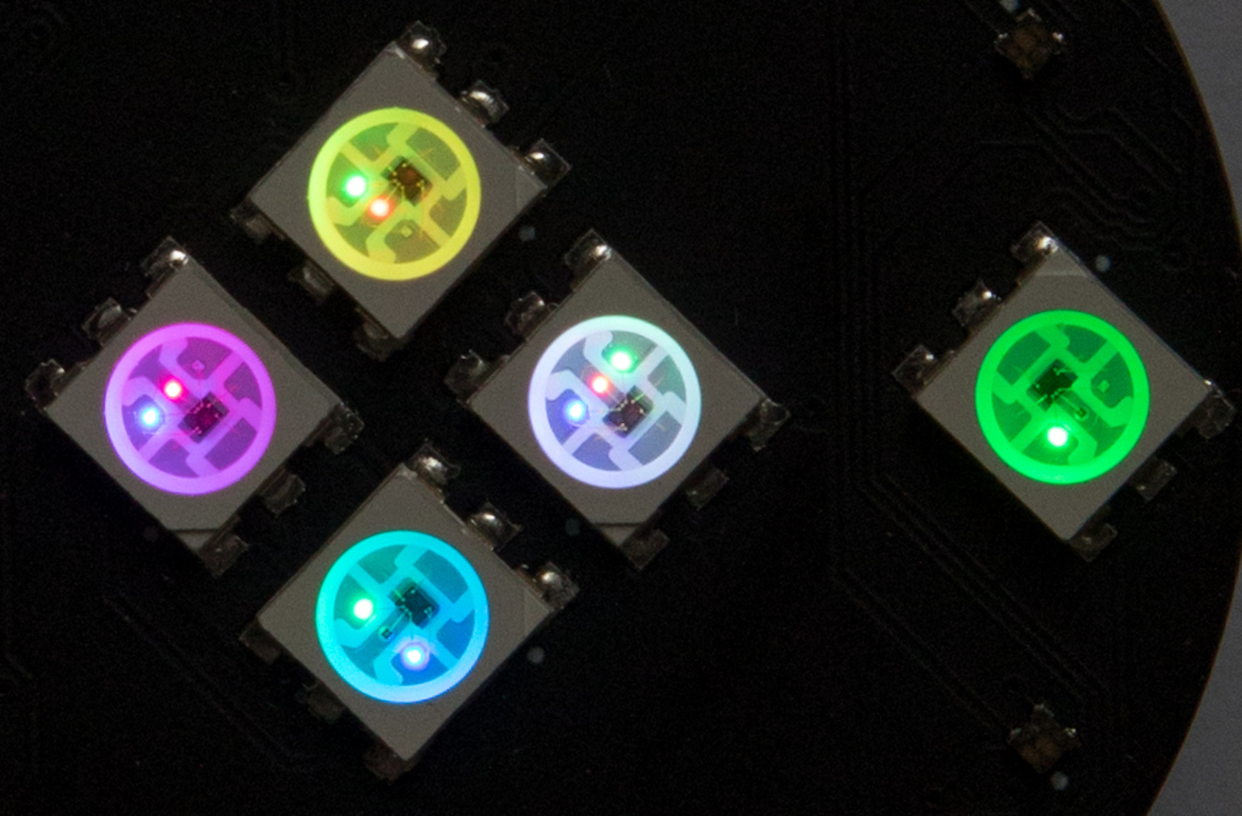 An up-close picture of some of the SpinWheel’s LEDs, showing the red, green, and blue subpixels.